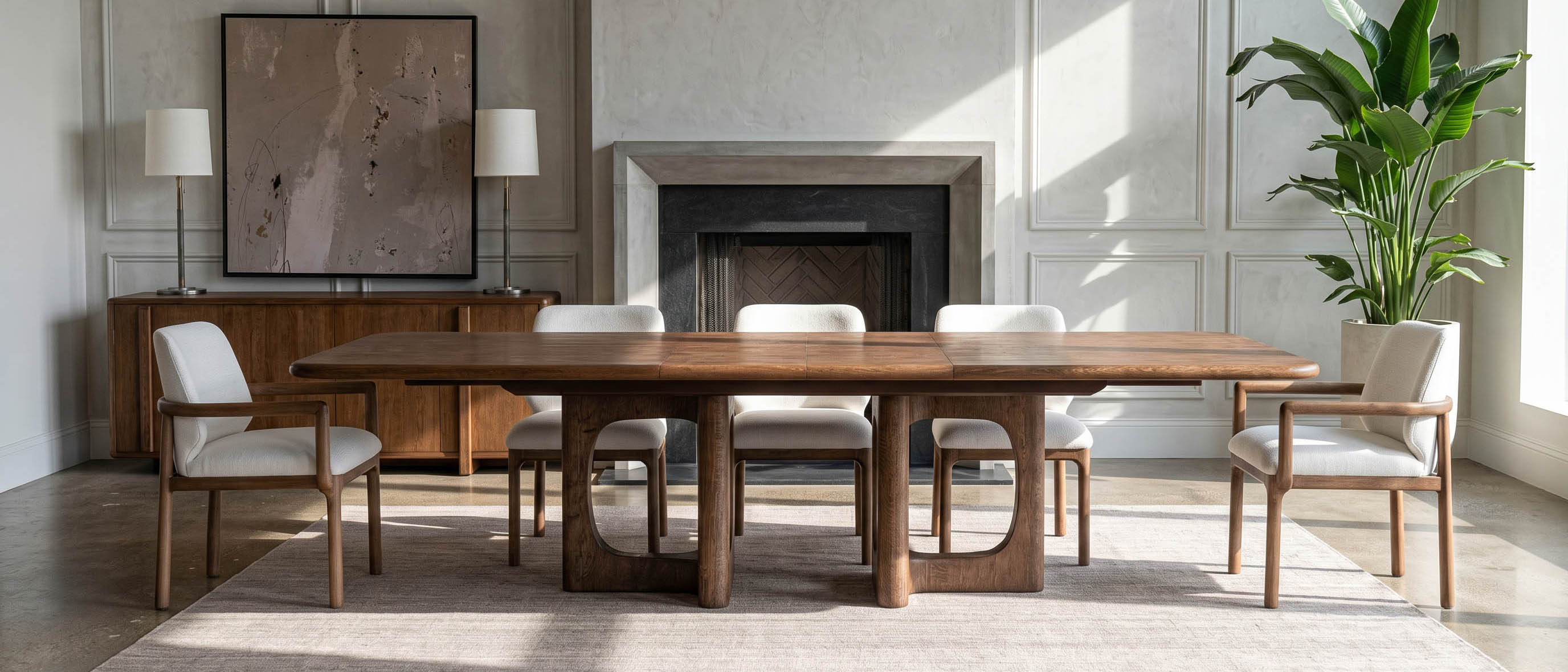 A dining room layered in oak, leather and warm metal